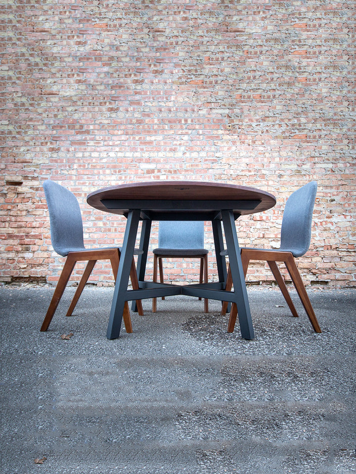 Modern Round Walnut Dining Table with Black Steel Legs